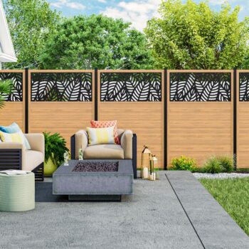 Backyard with vinyl privacy fence with decorative screen panel inserts